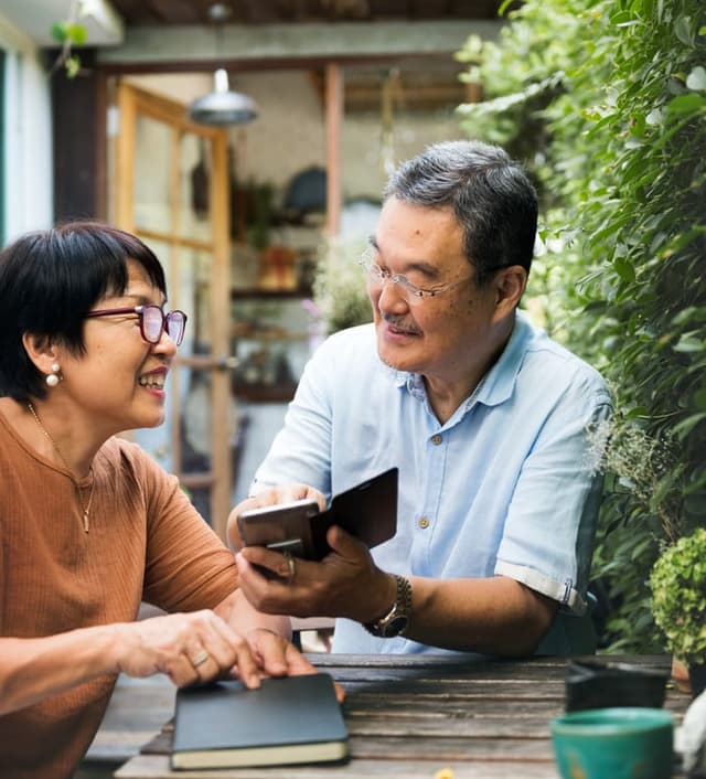 Couple reviewing a phone together